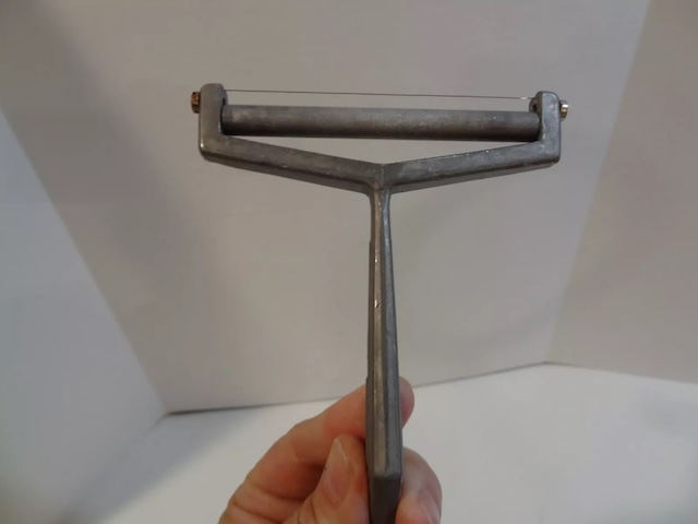 rediscovering-the-presto-cheese-slicer-a-piece-of-culinary-history-OKtu Rediscovering the Presto Cheese Slicer: A Piece of Culinary History