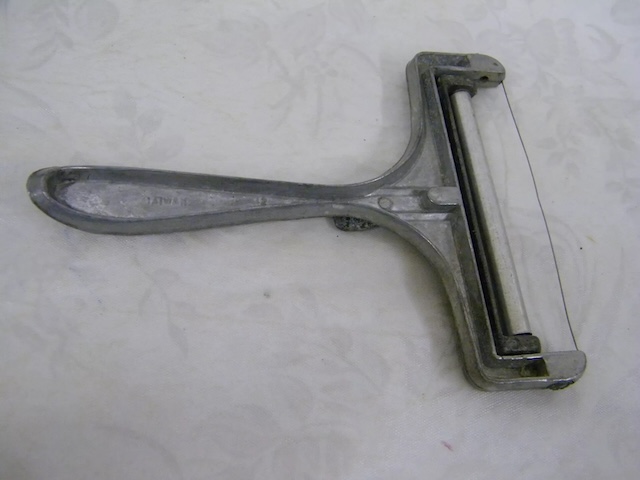 rediscovering-the-presto-cheese-slicer-a-piece-of-culinary-history-ozHO Rediscovering the Presto Cheese Slicer: A Piece of Culinary History